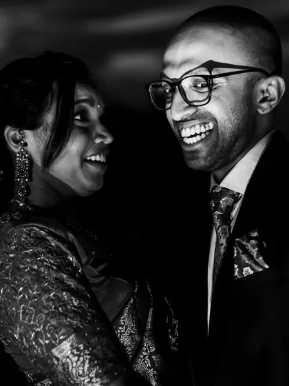 The "vampire" pose. Before the laughter, Ashwin got into character, and we created this fun, dramatic black and white portrait. I love it when couples are up for trying something different.