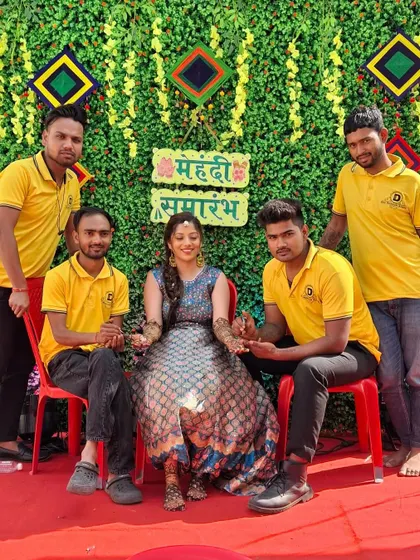 My team is ready to serve at a festive mehndi ceremony.