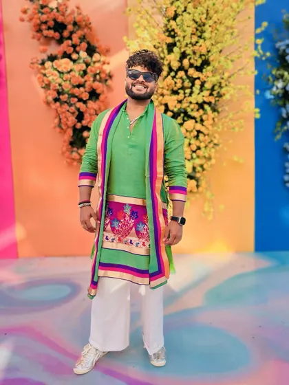 My look for a Maharashtrian wedding, a vibrant green kurta with a colorful stole.