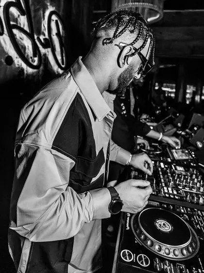 I get a lot of unsolicited advice from guys getting booked for a quarter of my price. This is me, in my zone at the DJ console, focused on my craft.