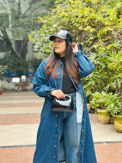The contrast of the dark wash jeans and the lighter wash jacket adds dimension to this monochrome blue look.