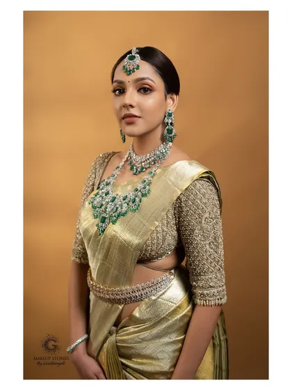 A three quarter view of the luxe glam South Indian look. This angle highlights the contour and highlight, techniques we cover in depth for sculpting the face.