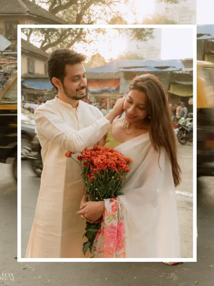 A candid moment of affection amidst the moving taxis and morning rush. This is the kind of raw, unposed photography I love.