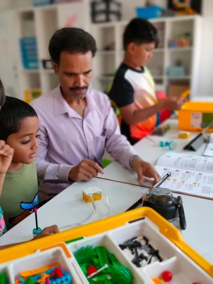 We provide a supportive environment where every question is encouraged. An instructor works with a small group of young learners, ensuring they grasp the fundamentals of building with LEGOs.
