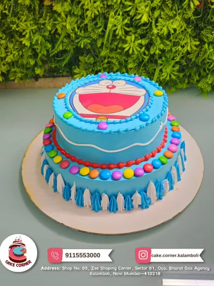 A colourful two-tier Doraemon cake, complete with his smiling face and bright gems. This cake is sure to bring a smile to any fan of the futuristic cat.
