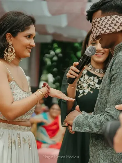Fun and games are an essential part of a Mehendi ceremony. We organized this playful blindfold game for Hema and Karthik, creating laughter and sweet memories for the couple and their guests.