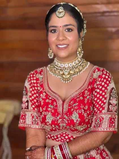 Khushi's complete bridal look. The makeup enhances her features beautifully, creating a look that is both traditional and stunning.