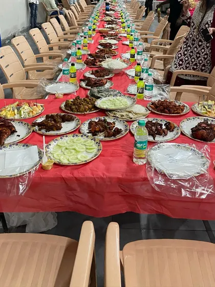 A Dastarkhwan table setup at RR Party Hall in Maddur. This shows the scale of our operation and the amount of food we prepare for a single event.