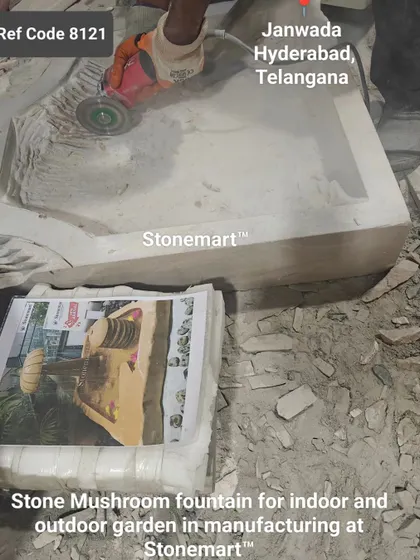 A stone mushroom fountain is being manufactured for a client in Hyderabad. The process starts with a large block of stone.