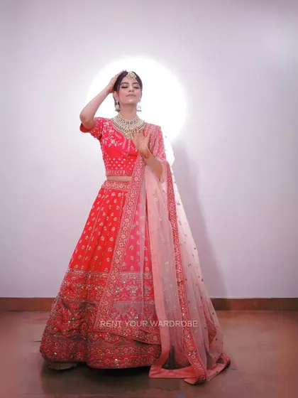 Another full-length shot of the pink lehenga, perfect for a sangeet or reception.