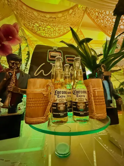 A close-up of the Corona beer display, part of a custom-themed station.