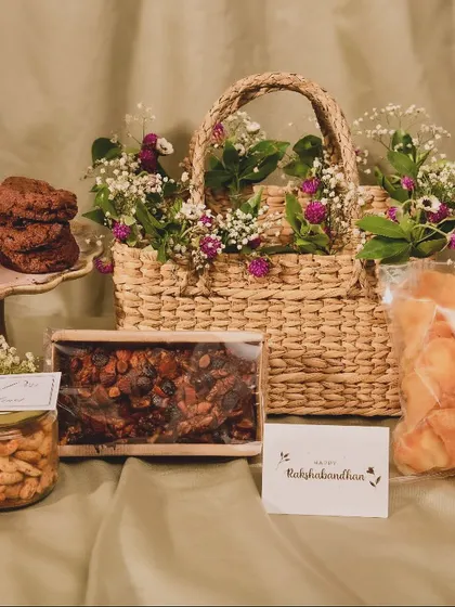 My Rakhi Hamper is a perfect balance of sweet and savory. This beautiful basket is curated with love and includes treats like truffle chips, assorted cookies, and flavored nuts to make your siblings feel special.