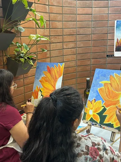 Another shot from the EYGBS workshop, with employees painting beautiful sunflower scenes. It's a great way to unwind after a busy work week.