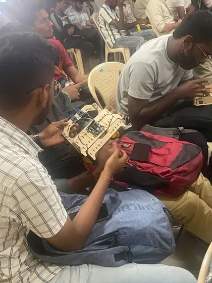 Engineering students getting their hands dirty, working together to assemble and wire their robots during our workshop. This is where theoretical knowledge meets practical application.
