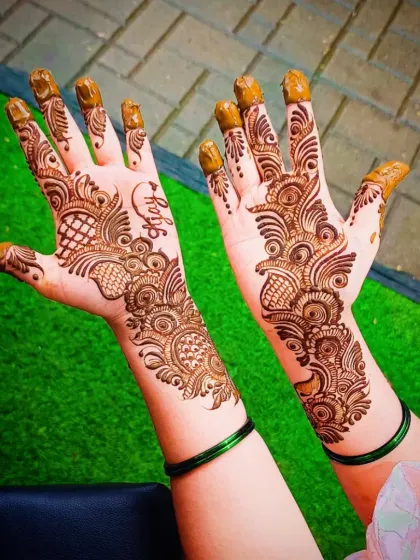 A close-up of the same design, showing the name "Puja" subtly included in the pattern.