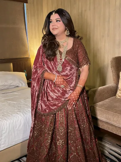 For Tisha's look, we did a beautiful burgundy smokey eye. This is a great way to incorporate color into a smokey eye, and it looked incredible with her velvet lehenga.