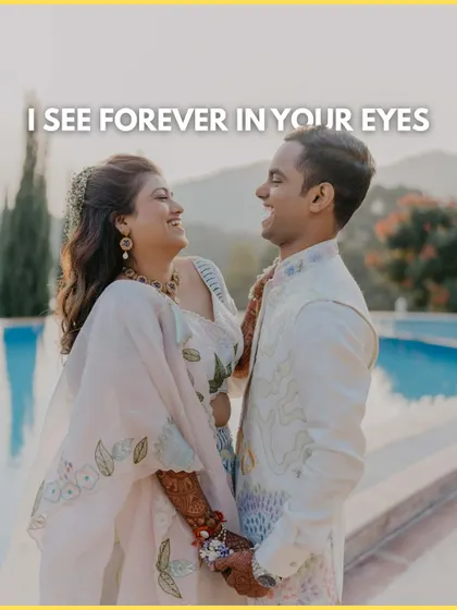 A moment of pure, unscripted laughter between the couple. This candid shot by the pool perfectly captures their chemistry and the happiness of their Haldi day.