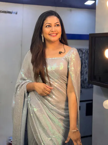 A backstage shot of Priyanka Barve, showing how the sequin saree catches the light.