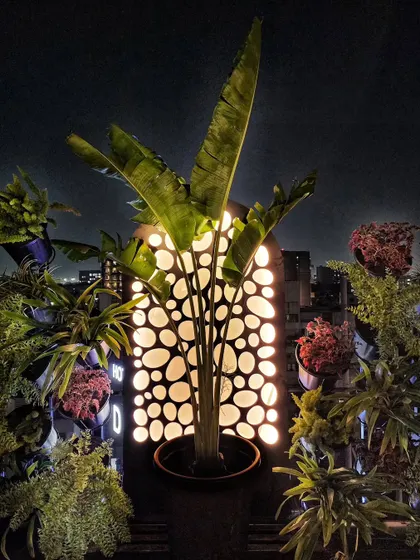 A work-in-progress shot from a hotel terrace project. We are creating a facade with plants and custom-designed dynamic light screens for a venue that will only be operational at night.