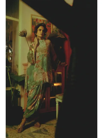 From Chapter 5, "Visitors of the past." The use of shadows and a partially obscured frame creates a sense of being watched by memories, a central theme in this fashion editorial.