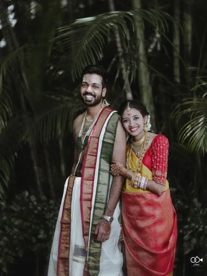 A beautiful post-ceremony portrait of the couple, their smiles reflecting their newfound marital bliss.