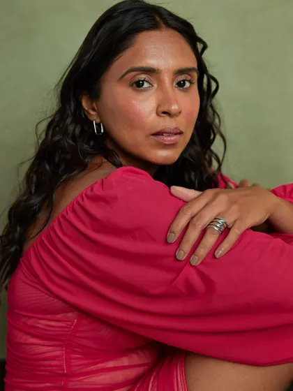 A close-up from the same session, focusing on expression and mood. The soft texture of the dress and the direct gaze create a compelling and engaging actor portrait.