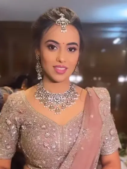 A client ready for her event, with a textured updo that beautifully complements her silver jewelry.