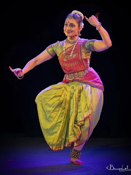 A dynamic and energetic pose, captured mid-movement.