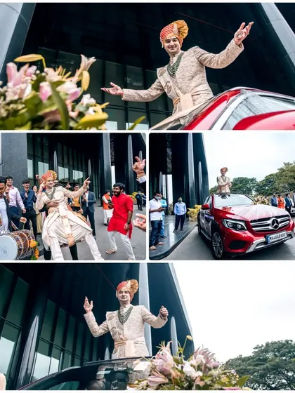 The groom's grand arrival, dancing with his baraat in front of the modern architecture of the wedding venue.