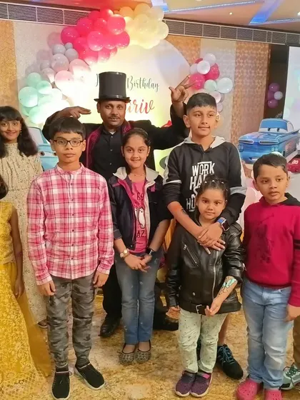 Another great memory captured with the young audience members after a show. Seeing their happy and amazed faces is the reason I love being a magician.