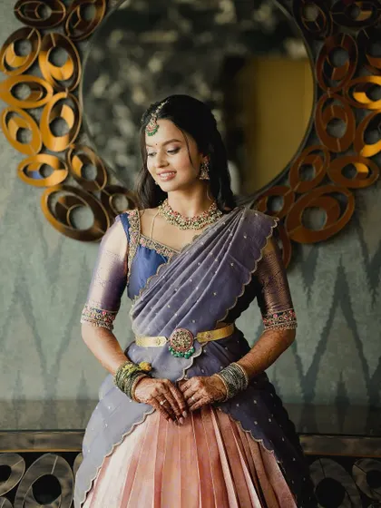 The intricate details of the langa voni are perfectly captured in this shot against a decorative mirror.