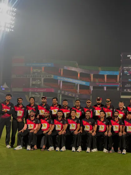 The full squad photo at night, after being crowned champions of the Delhi Premier League.