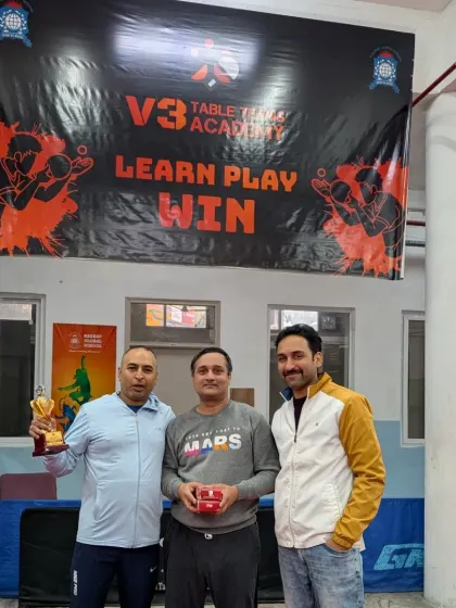 The doubles runners-up receiving their prize. Teamwork and strategy are just as important as individual skill, and our doubles events are always competitive.