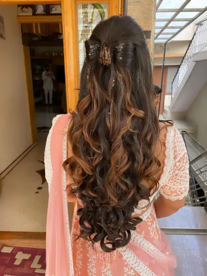 A full view of the highlighted curls, perfect for adding dimension and style to any occasion.