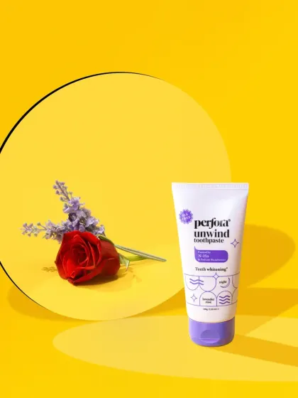 A romantic and floral-themed shot for Perfora's "Unwind" toothpaste. The combination of a bright yellow background with a red rose and lavender creates a unique and visually striking image.