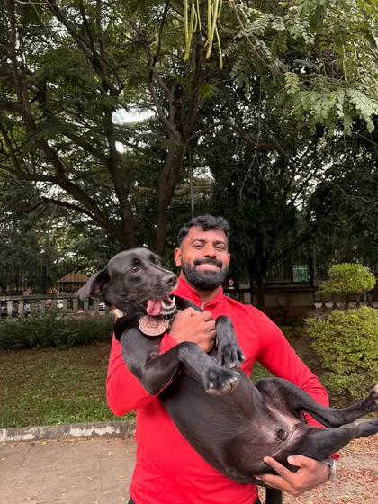 Pure joy. Holding Batman after a race, celebrating our shared victory.