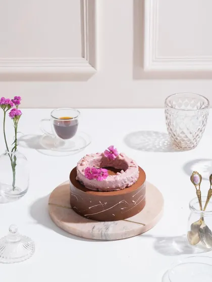 Our Belgian Chocolate and Raspberry Entremet, set for a weekend indulgence with a cup of coffee.