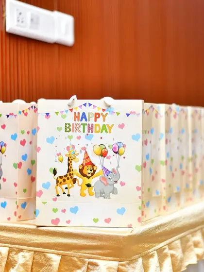I can also arrange for themed return gifts, like these cute animal-print goodie bags.