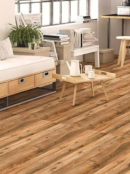 This rustic wood flooring adds texture and warmth to a cozy, multifunctional room. The visible knots and grain patterns give it a unique character that is both stylish and forgiving for everyday life.