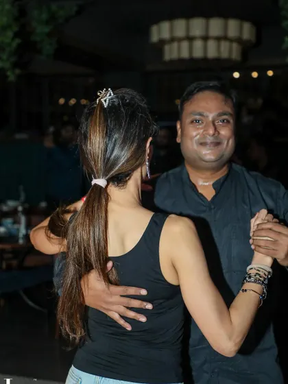 A student enjoying a dance with one of our instructors. We are always on hand to dance and help you improve.