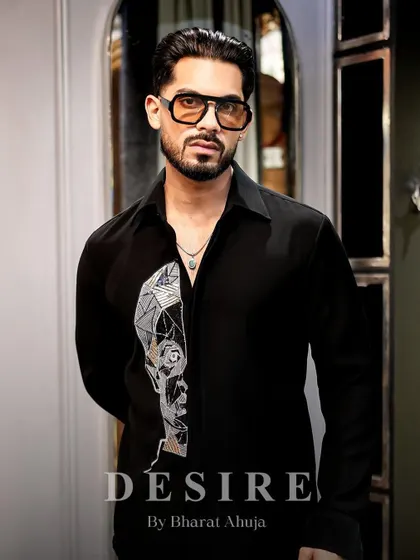 Power dressing, redefined. The abstract face shirt is a statement of bold details and timeless attitude.