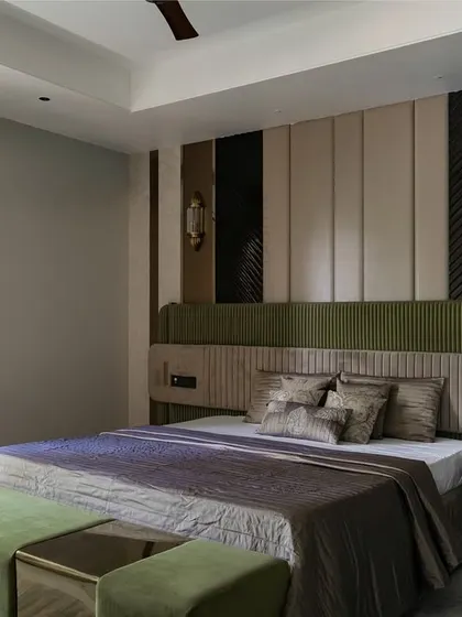 A beautifully appointed bedroom showcasing our signature style of quiet luxury. This space combines layered textures, a soothing color palette, and bespoke furniture to create a personal sanctuary for rest and relaxation.