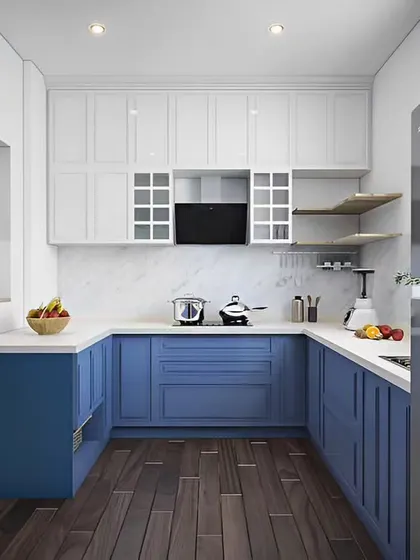 A classic kitchen design with blue shaker-style lower cabinets and white upper cabinets. The dark wood flooring provides a warm contrast, creating a timeless and inviting atmosphere.