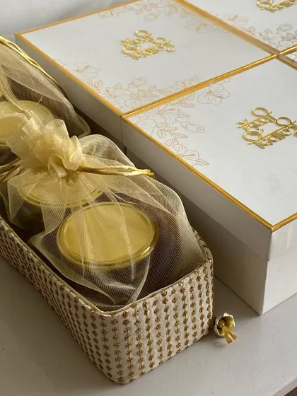 A beautifully arranged hamper featuring jars of my homemade treats, perfect for a family gift.