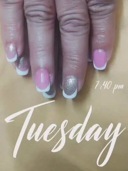 A mix-and-match style combining a pink French manicure with a silver glitter accent nail.