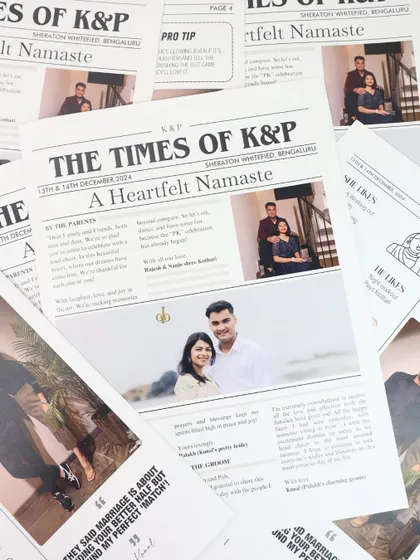 Your love story, front-page news. This is a custom wedding itinerary we designed to look like a newspaper, "The Times of K&P," sharing the couple's story and event details in a truly unique and memorable format.