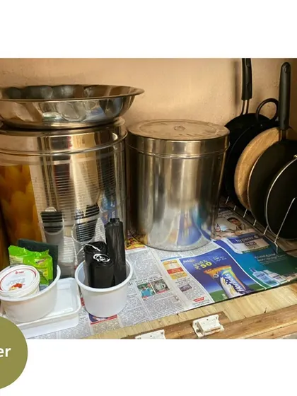 The organized "after" shot. We used a simple rack to store pans vertically and arranged the other items so that everything is accessible without moving other things.