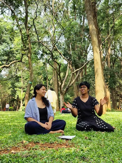 Two facilitators leading a discussion at the BLR Wellbeing Community circle. It's a space for sharing and learning together.