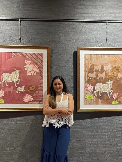 Standing with my Heritage Collection at a gallery show. It's a proud moment to share these deeply personal, faith-inspired works with the public.