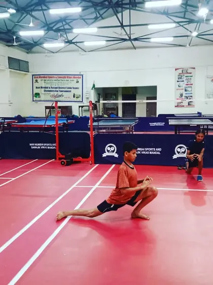 Young players warming up with stretches. Proper physical preparation is a part of every training session, even for our junior batches.